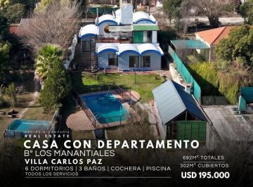 Casa · 302m² · 10 Ambientes · 2 Cocheras · Venta Casa con Pileta con Departamento Independiente en Los Manantiales – Villa Carlos Paz
