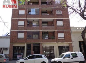 Fachada Edificio · Local Comercial con Deposito