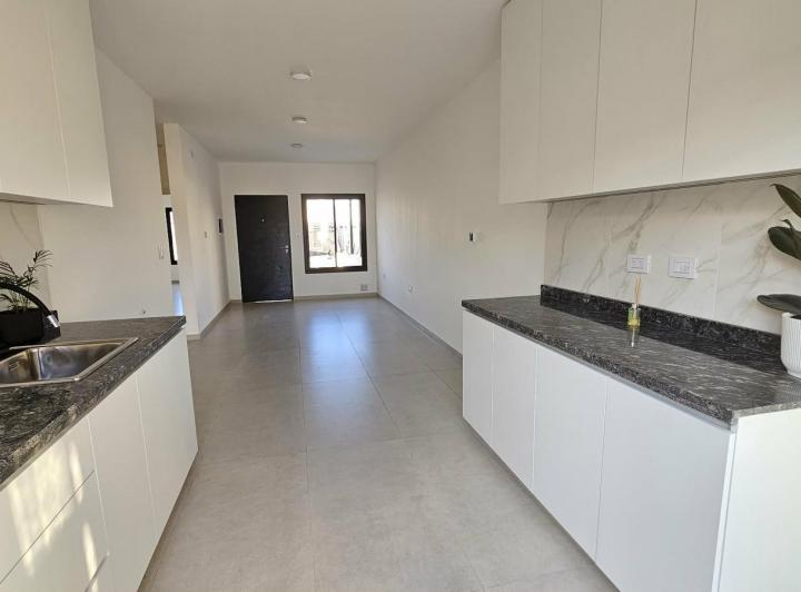 Casa · 70m² · 4 Ambientes · 1 Cochera