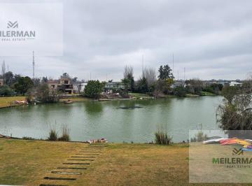 Departamento · 69m² · 2 Ambientes · 1 Cochera · Venta de Departamento de 2 Ambientes con Vista a La Laguna y Cochera
