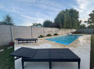 Casa · 82m² · 4 Ambientes · 1 Cochera · Casa en Venta en Bragado con Pileta