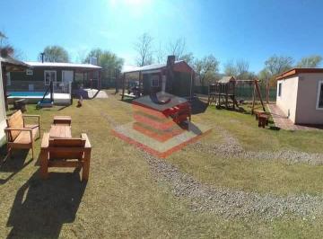 Casa · 340m² · 9 Ambientes · 2 Cocheras · En Venta Complejo de 5 Cabañas Amoblado con Pileta en Cosquin a 600 m de La Juntura de Rios Ref: 2029