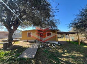 Casa · 80m² · 6 Ambientes · 2 Cocheras · Venta de Complejo de 2 Cabañas con Pileta en Cosquin Ref1367