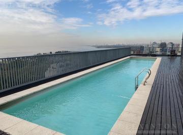 Piscina exterior · Piso Alto - Full Amenities - Alquiler Departamento 2 o 3 Dorm. - Torre Awwa