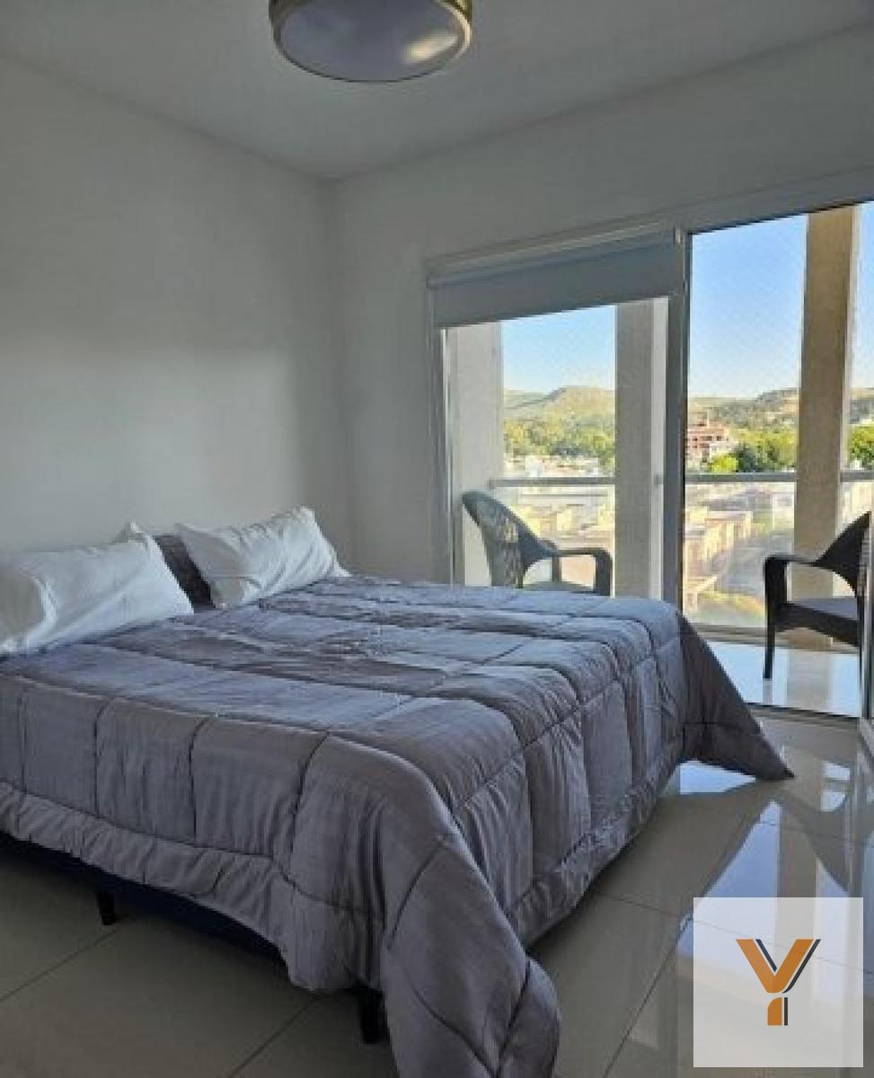 Departamento 2 dorm, 60m² en piso alto con cochera — Centro