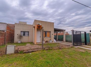 Casa · 58m² · 4 Ambientes · 1 Cochera · Casa en Venta en Puerto General San Martín.
