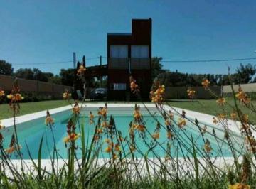 Casa · 83m² · 2 Ambientes · 1 Cochera · Casa en Roldán
