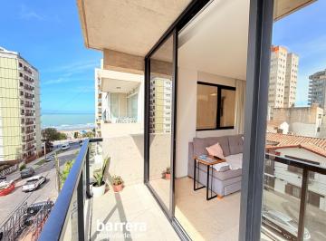 Departamento · 52m² · 2 Ambientes · 1 Cochera · 2 Amb Moderno con Cochera y Vista Lateral Mar - Playa Grande (Se Vende con Muebles)