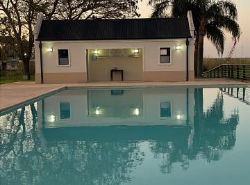 Casa de 5 ambientes, Pueblo Esther · Exclusiva Propiedad en Country Náutico La Bahía | Confort, Piscina y Seguridad D