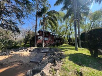 Casa · 96m² · 3 Ambientes · Venta de Terreno con 3 Cabañas Canal Arias Delta