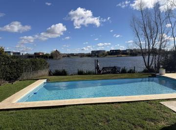 Casa · 240m² · 7 Ambientes · 6 Cocheras · Casa a Laguna en Venta en Canton Islas