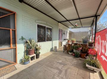 Casa · 124m² · 4 Ambientes · 1 Cochera · Casa con Local en Venta en Juan Lacaze