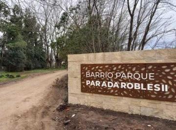 Entrada Barrio Parque Robles II.jpeg · Terreno 1.643 m² Apto Pileta en Parada de Robles