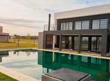 Casa · 164m² · 5 Ambientes · 2 Cocheras · Venta Casa 5 Ambientes Puertos del Lago Sector Nativas con Pileta Financia