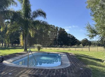 Foto1 · Chacra con Buena Casa Cuenta con Piscina Cerca de Pueblo Eden.