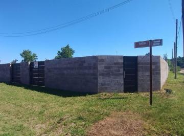 Terreno · 595m² · Venta de Lote con Medianera y Portones de Hierro