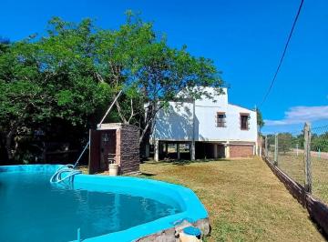 Quinta vacacional · 117m² · 2 Dormitorios · 1 Cochera · ¡Venta de Casa Quinta en Arroyo Leyes!