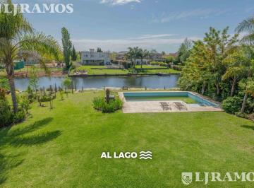 Casa · 255m² · 7 Ambientes · 4 Cocheras · 30/12 a 31/03. a Laguna. 4 Dorm., Escritorio y Area Servicio.
