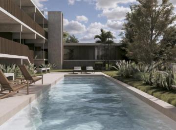 Departamento · 58m² · 2 Ambientes · 1 Cochera · La Emramada. Venta 2 Amb. Pb con Jardin.