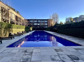 Departamento · 117m² · 2 Ambientes · 1 Cochera · Impecable Loft con Entrepiso, 1 Dormitorio (Posibilidad Realizar 2do), 2 Baños, Seguridad Amenities