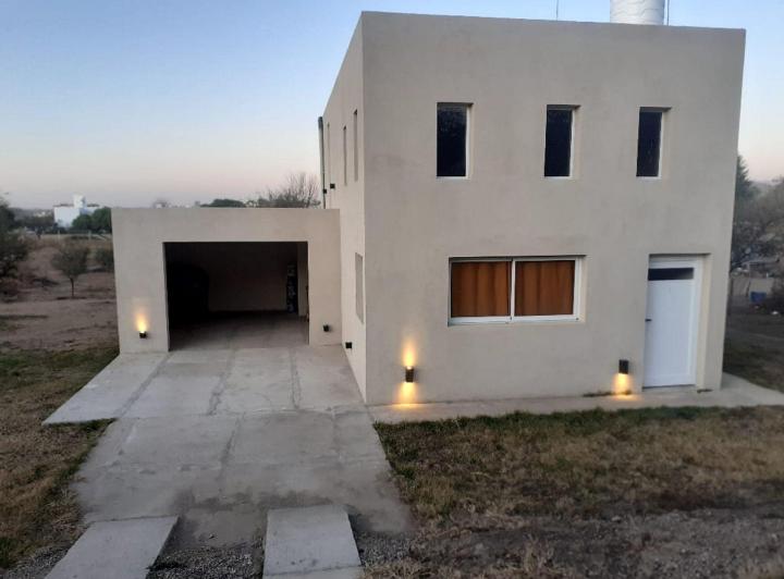Casa · 110m² · 4 Ambientes · 1 Cochera