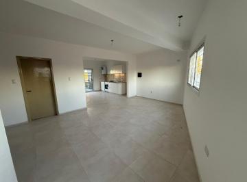 Living-comedor integrado con la cocina · A Estrenar - 117 m², 3 Dorm. y Terraza con Asador