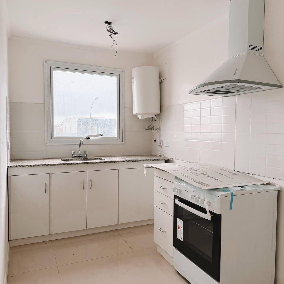 Depto 2 amb, 42m² con patio y cochera — San Juan