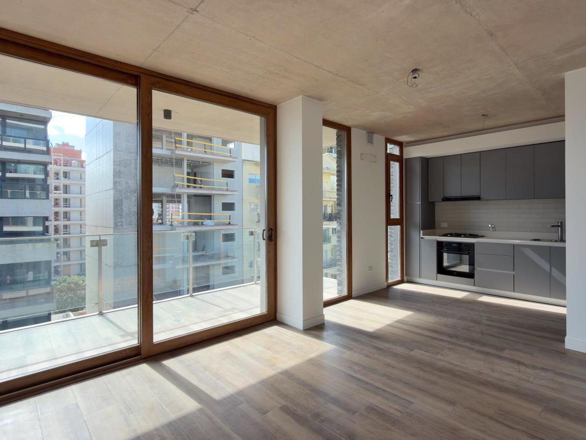 Venta de depto 2 ambientes con balcon Y parrilla Y cochera cubierta