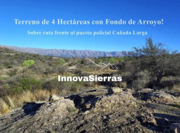 Terreno · 4ha · Fondo de Arroyo! Terreno de 4 Has en Venta en Mina Clavero | Frente Sobre Ruta E - 34 | Escritura