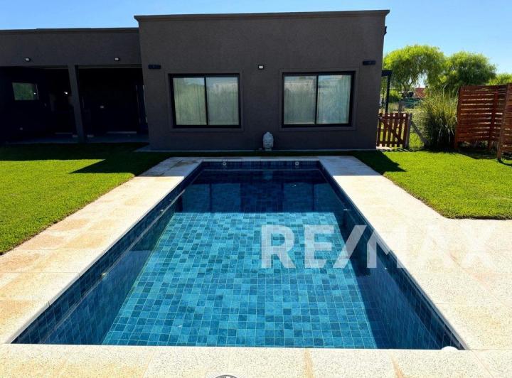 Casa · 128m² · 4 Ambientes · 2 Cocheras