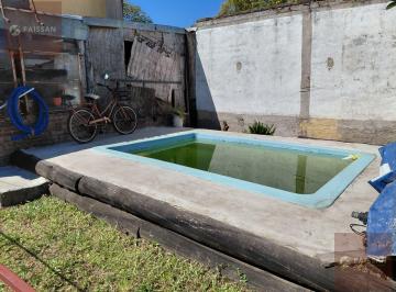 Casa · 147m² · 4 Ambientes · 1 Cochera · Oportunidad en Muñiz: Dos Casas en Lote con Jardín y Pileta