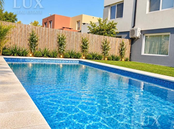 Casa · 120m² · 5 Ambientes · 4 Cocheras