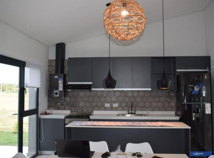 Casa · 70m² · 4 Ambientes · 1 Cochera