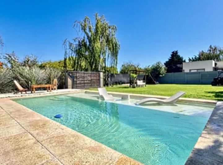 Casa · 130m² · 3 Ambientes · 2 Cocheras