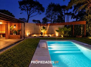 Foto1 · Casa de 4 Dorm. con Piscina Climatizada y Gran Área Social en Lugano, Punta del Este