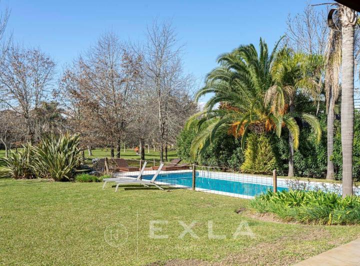 Casa · 345m² · 7 Ambientes · 2 Cocheras
