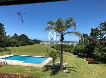 Foto1 · En Solanas Hermosa Casa Primera Linea Al Mar en Venta