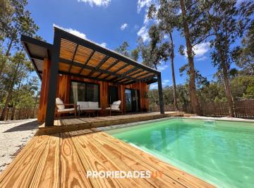 Foto1 · Casa con Piscina Climatizada en La Barra - 2 Dorm., Para 5 Personas