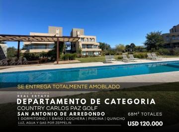 Departamento · 68m² · 3 Ambientes · 1 Cochera · Venta de Exclusivo Departamento de Categoría de un Dormitorio en Country Carlos Paz Golf