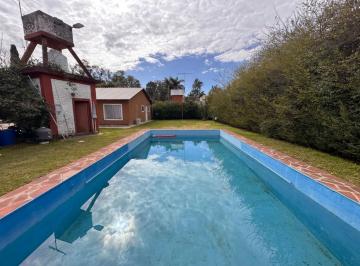 Casa · 219m² · 5 Ambientes · 2 Cocheras · Venta de Casa Multifamiliar con Pileta en Barrio Montecarlo del Viso Pilar