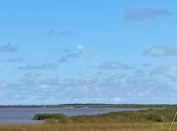 Foto1 · Campo con Costa Laguna Garzon