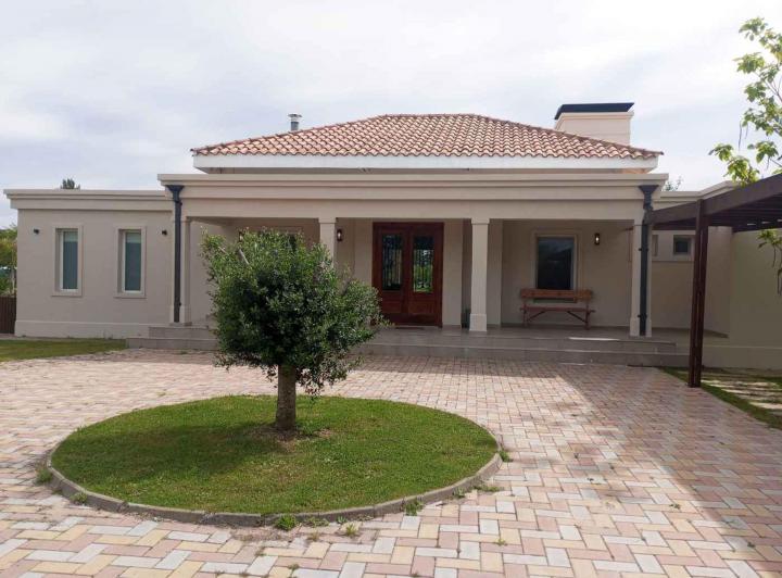 Casa · 160m² · 5 Ambientes · 2 Cocheras