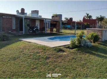 Casa de 9 ambientes, Arroyo Leyes · Casa Quinta en Km 12 Ruta 1 Arroyo Leyes Calle Sapirandi y Calle Los Caracoleros.