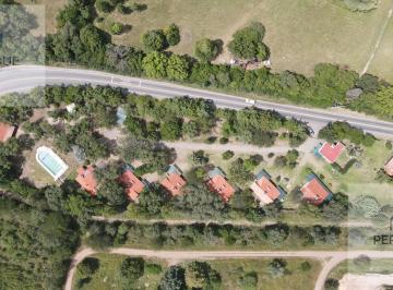 Hotel · 20000ha · 18 Ambientes · 13 Cocheras · Venta de Complejo de Cabañas en Cosquin Cordoba. Inversionista