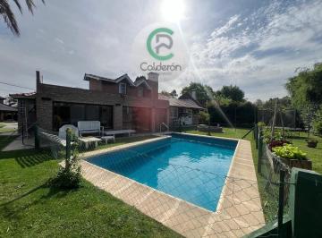 Casa · 195m² · 4 Ambientes · 5 Cocheras · Casa en Alquiler Temporario. Country Banco Provincia.