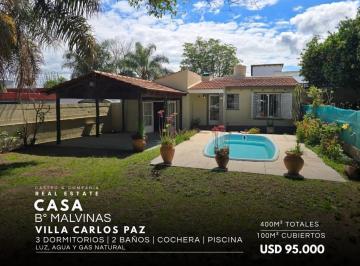 Casa · 100m² · 5 Ambientes · 1 Cochera · Venta Casa de 3 Dorm. con Pileta y Jardín en Barrio Malvinas Villa Carlos Paz