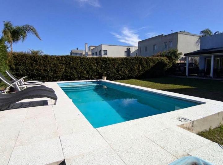 Casa · 104m² · 4 Ambientes · 2 Cocheras