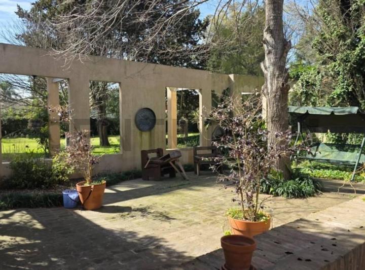 Casa · 250m² · 7 Ambientes · 1 Cochera