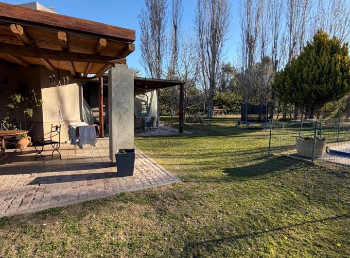 Casa · 222m² · 8 Ambientes · 1 Cochera