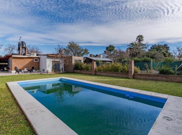 Casa · 145m² · 5 Ambientes · 2 Cocheras